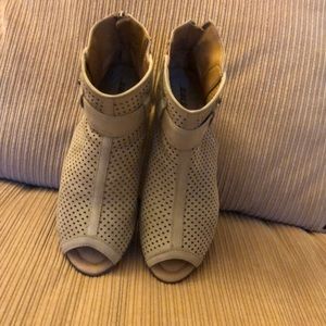 Earth cut out ankle boots.